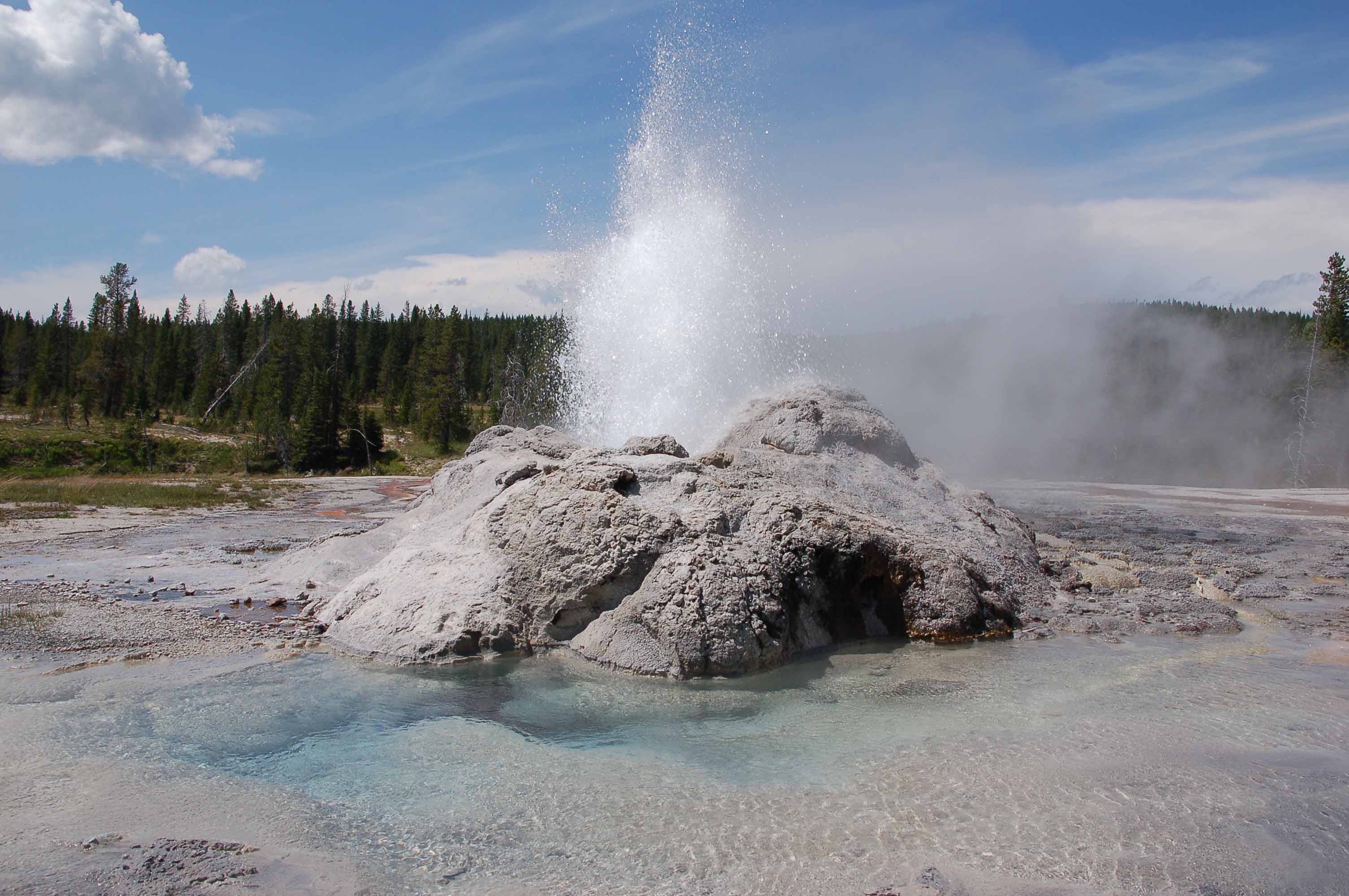 A body of water with smoke coming out of it

Description automatically generated